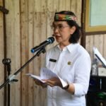 Pj. Sekda Kalteng Linae Victoria Aden saat membacakan sambutan Gubernur. (Ist)
